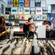 Customers sift through albums in a record store during the international Record Store Day in Stockholm